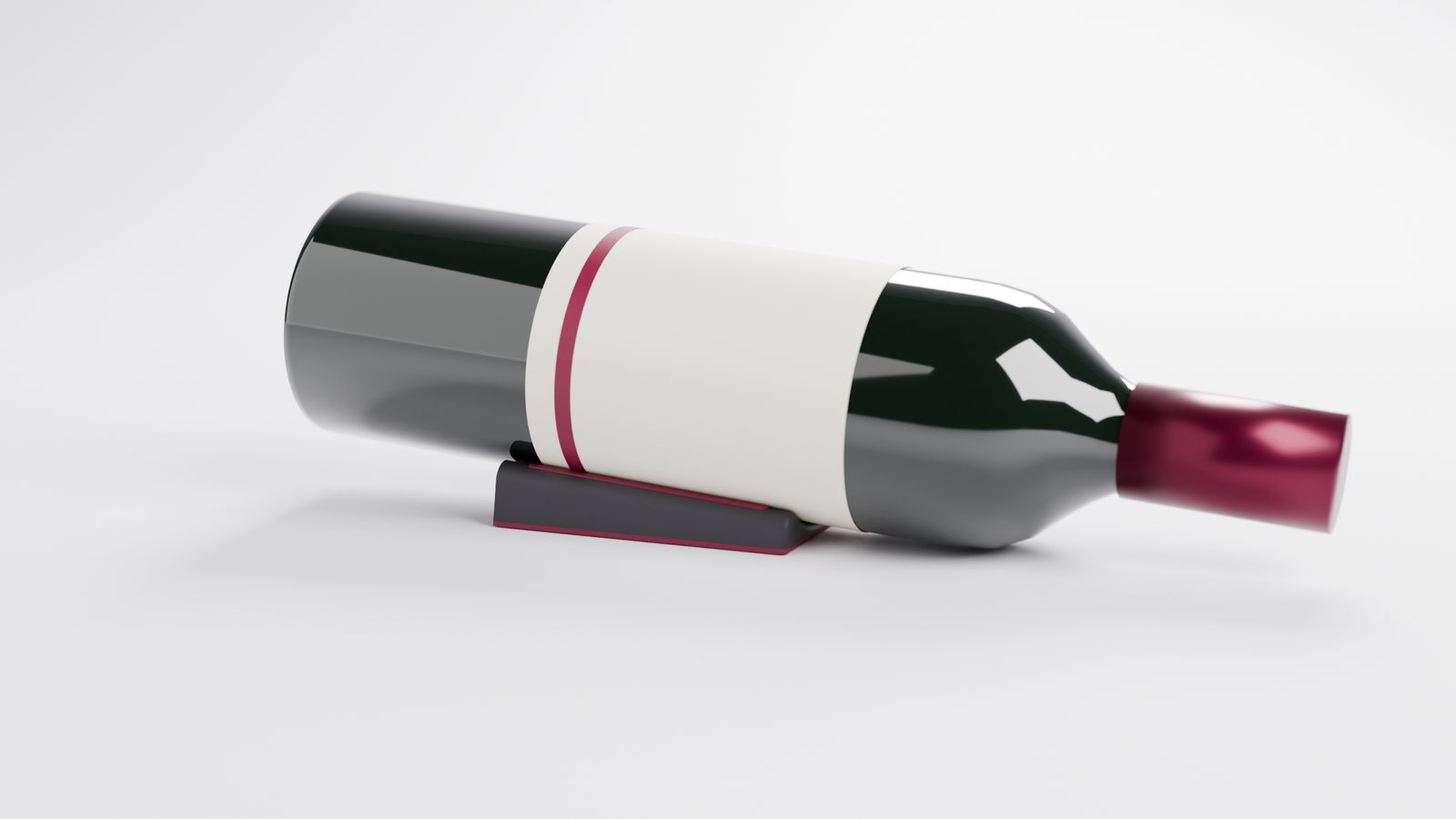 A wine bottle resting neck-down on a charcoal Bottle Staxx wedge with Merlot grip strips