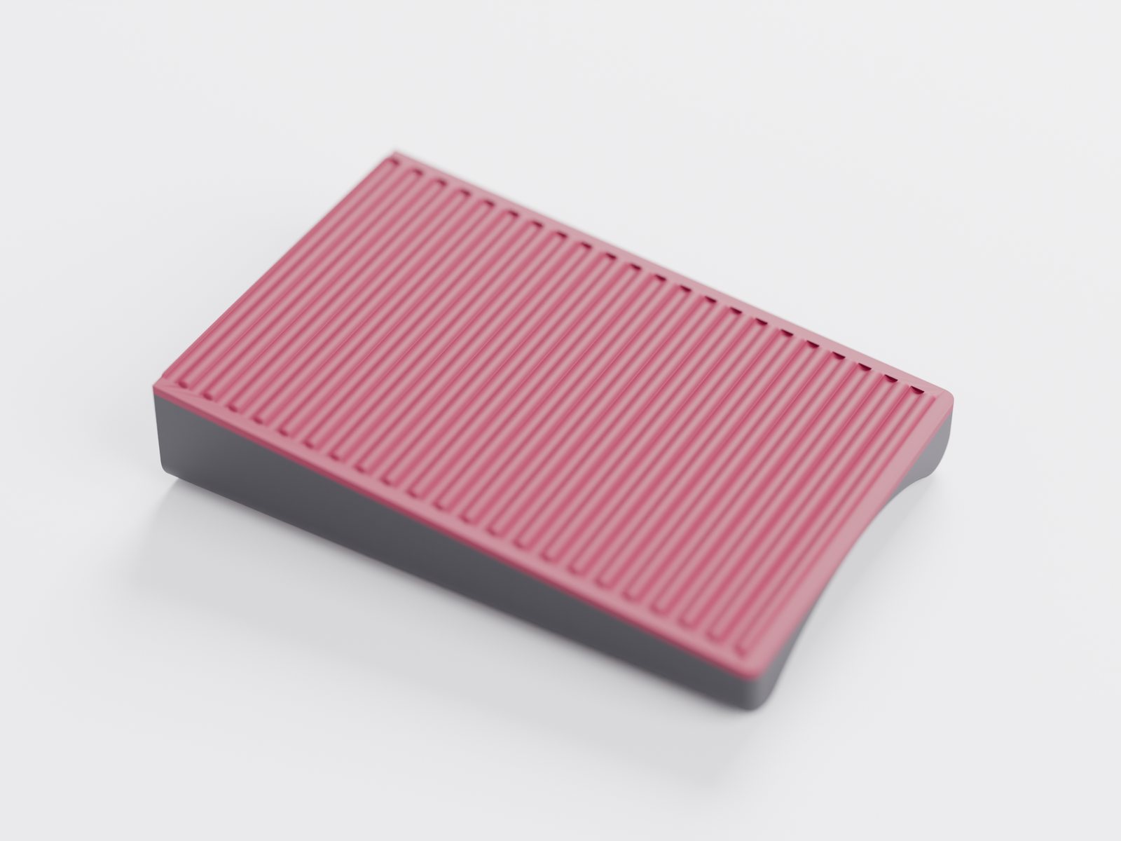 The wedge turned over, showing its ribbed TPU grip base